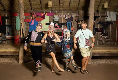 Dramatic Siam Niramit Phuket stage scene with mythical creatures, vibrant lighting, and traditional Thai performers.