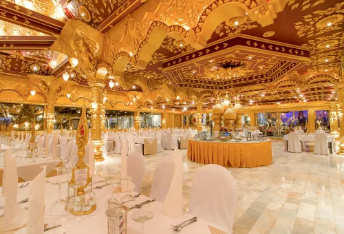 Traditional Thai performers in elegant costumes taking a bow at the end of Phuket FantaSea Show