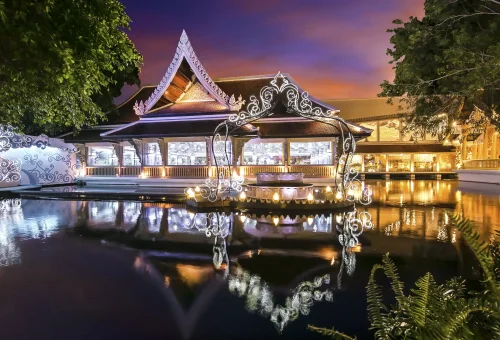Performers in ornate Thai costumes on stage during a cultural show at Phuket FantaSea