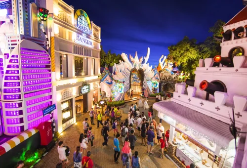 Guests dining in a lavishly decorated Thai-style banquet hall at Phuket FantaSea