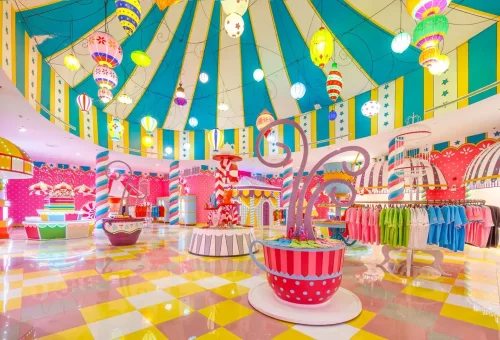 Magical light tunnel with glowing arches and vibrant colors at Carnival Magic Phuket