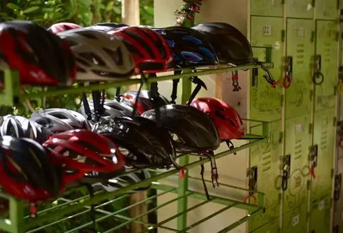 Visitor collecting a safety helmet before the ride at Phuket ATV Adventure, offered by Phuket Travel Store