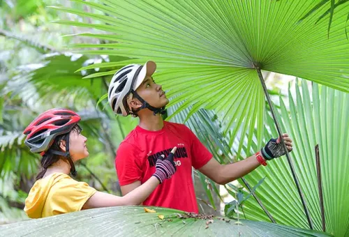 Happy ATV riders exploring lush jungle trails at Phuket ATV Adventure, featured by Phuket Travel Store