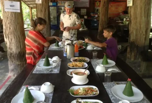 Scenic outdoor lunch setting at Anda Adventure in Phang Nga surrounded by lush jungle – PhuketTravelStore.com
