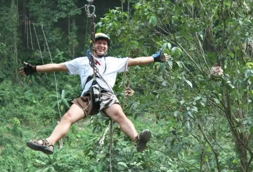 Ziplining high above the treetops in Phuket with Anda Adventure – scenic rainforest views – PhuketTravelStore.com