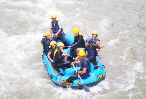Adventurers rafting through scenic jungle river in Phang Nga with Anda Adventure – PhuketTravelStore.com