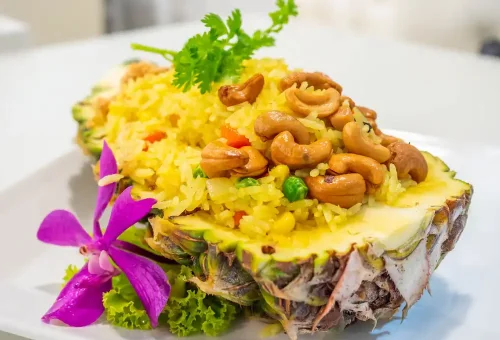 Stir-fried Chicken with Cashew Nuts from Kata Thai Cooking Class – savory Thai dish with vegetables, chili, and roasted cashews.