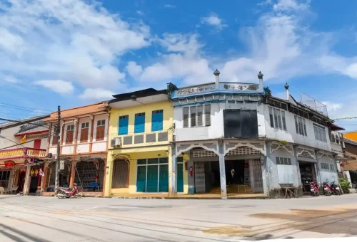 Colorful heritage buildings and vintage shophouses in Old Town Takuapa, reflecting the area's rich cultural and architectural history.