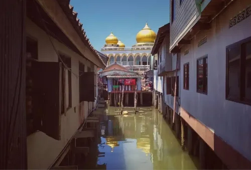 Colorful stilt houses and mosque at Koh Panyee floating village in Phang Nga Bay, Thailand