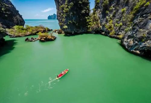 Canoeing through sea caves and hidden lagoons at Hong Island in Phang Nga Bay, Thailand