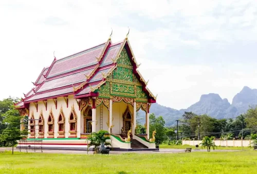 Visiting a Buddhist temple near Khao Sok National Park – traditional Thai architecture and serene cultural atmosphere