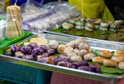 View of Naka Market with crowds enjoying street food and weekend shopping