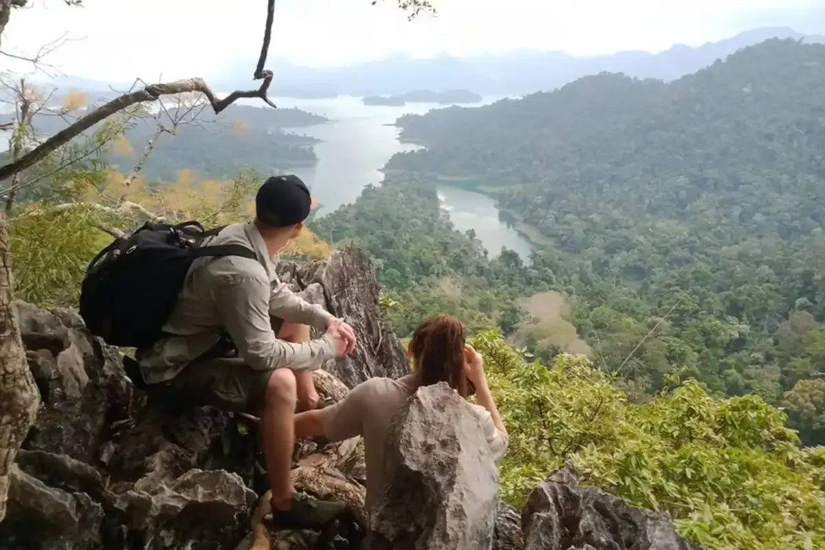 Stunning viewpoint overlooking Cheow Lan Lake and limestone cliffs in Khao Sok National Park on a two-day tour with Phuket Travel Store