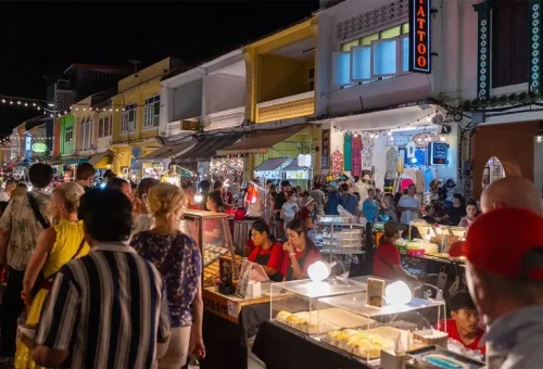 Evening stroll at Thalang Road Sunday Market in Phuket Town with Phuket Travel Store – local food stalls, souvenirs, and live entertainment