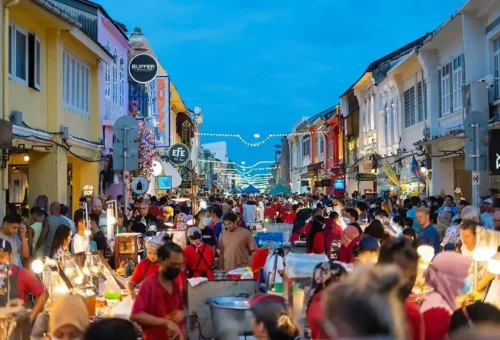 Phuket Travel Store tour at Thalang Road Sunday Market – colorful lights, handcrafted goods, and local Thai street food