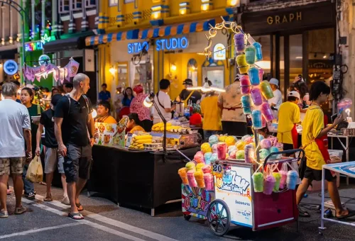 Phuket Travel Store at Thalang Road Sunday Market – street vendors, colorful lanterns, and vibrant market atmosphere in Phuket Town