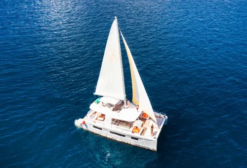 Elegant view of the Elizabeth private sailing yacht gliding through Phuket’s turquoise waters with Phuket Travel Store