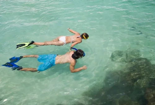 Guests relaxing inside Super-F’s luxury longtail boat with Phuket Travel Store