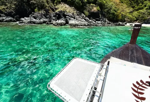 Happy customer inside the exclusive Super-F longtail boat with Phuket Travel Store