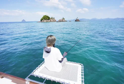 Guests enjoying a luxurious ride aboard Super-S longtail boat with Phuket Travel Store