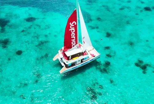 Super-X private yacht featuring water slide and lounge area on Phuket sea tour