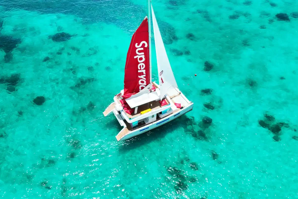 Super-X private yacht featuring water slide and lounge area on Phuket sea tour