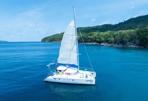 Super-V catamaran with lounge deck and shaded seating on a Phuket tour