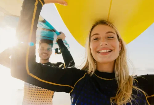 Super-Y yacht anchored near a tropical island with Phuket Travel Store