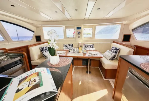 Modern Super-Y catamaran gliding through turquoise Phuket waters