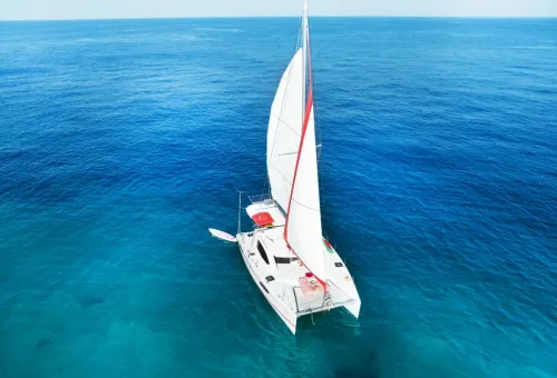 Luxury Super-Y yacht sailing across the Andaman Sea with Phuket Travel Store