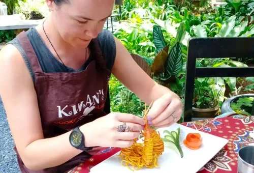 Tourists enjoying Thai cooking session in Khao Lak