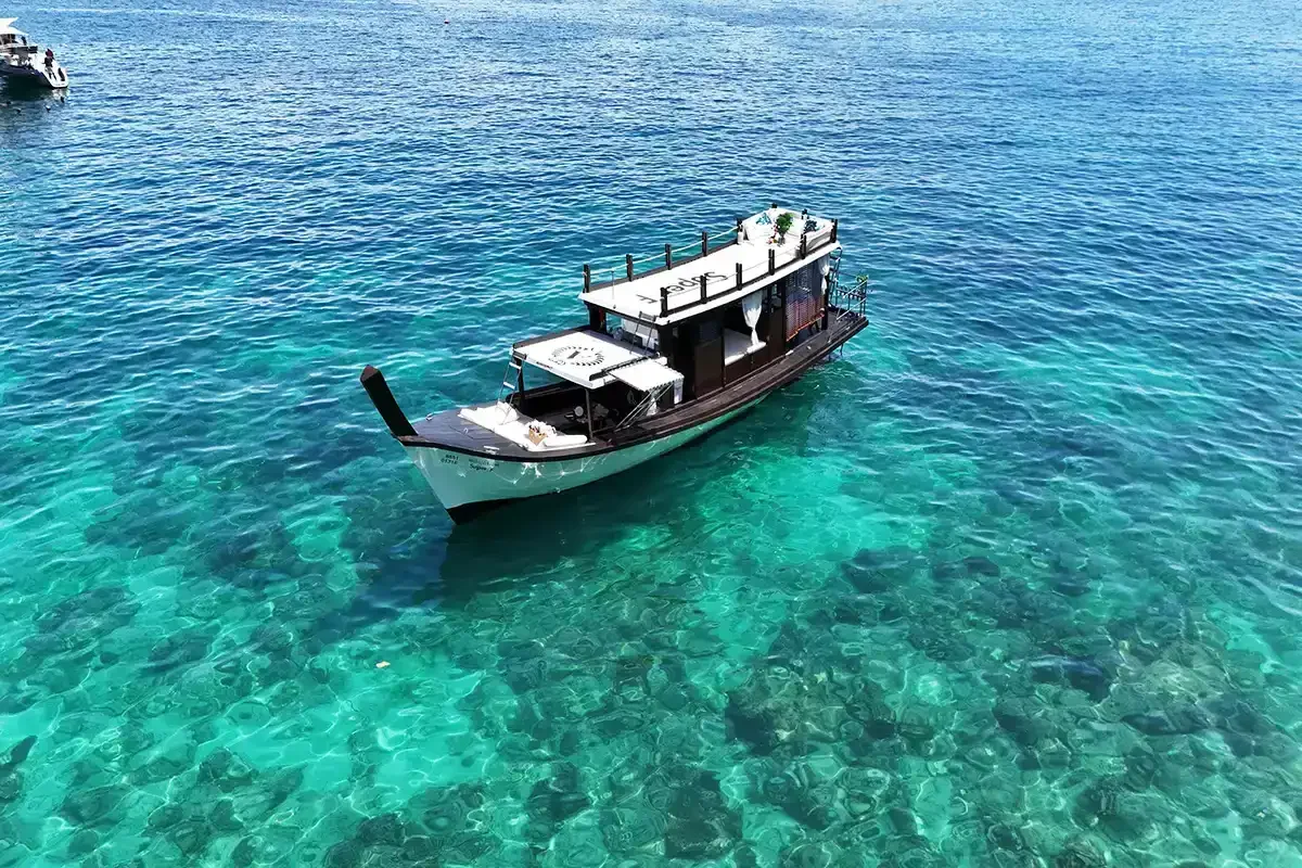 Super-F luxury longtail boat approaching James Bond Island in Phang Nga Bay