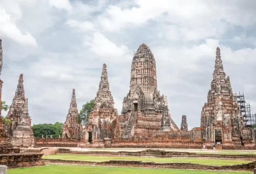 Traveler exploring Ayutthaya's ancient ruins and tasting traditional Thai food on the Ancient Ayutthaya Food & History Tour