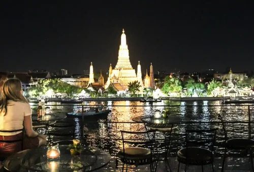 Guest enjoying roti with condensed milk at Khao San area during Bangkok Midnight Food Tour by Tuk Tuk with Phuket Travel Store