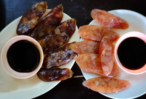 Traditional Thai sweet sausage served with dipping sauce