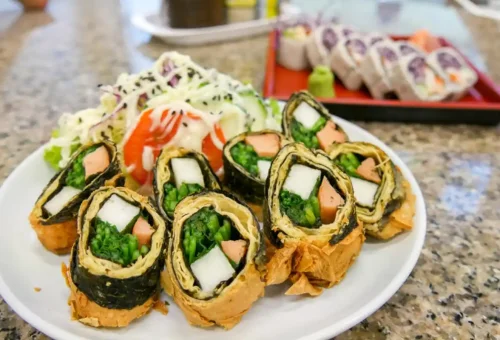 Crispy vegetarian sushi rolls with seaweed, tofu, and fresh greens