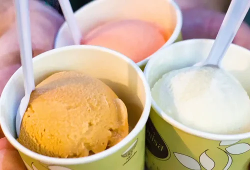 Cups of Thai ice cream in coconut, mango, and fruit flavors