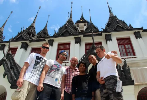 Tour group in front of Loha Prasat Temple in Bangkok