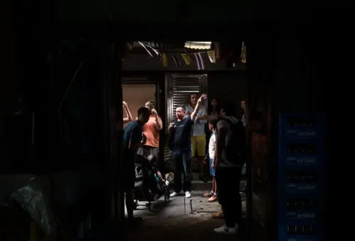 Tour guide leading visitors through a narrow alley