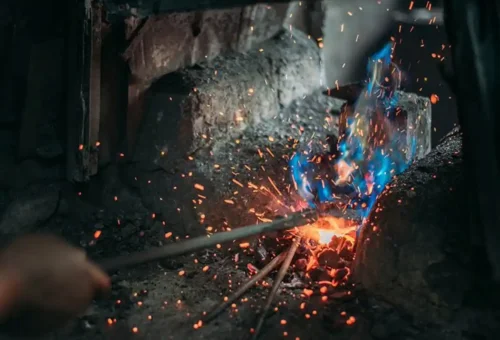 Sparks fly in traditional blacksmith workshop in Bangkok Chinatown