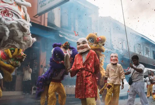 Chinese lion dance during street celebration in Bangkok Chinatown