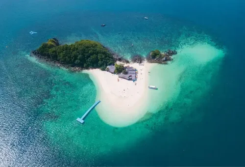Aerial view of Khai Island with white sandy beach, turquoise sea, and boats – Phuket Travel Store