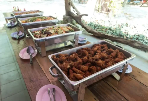 Buffet lunch featuring fried chicken and vegetables on Surin Islands tour