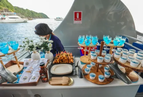 Thai snacks and signature blue cocktails on Phi Phi catamaran