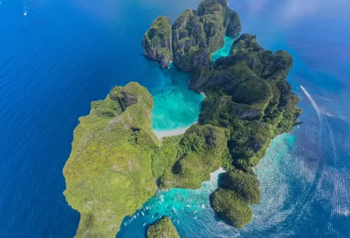 Aerial view of Phi Phi Leh with turquoise bays and limestone cliffs.