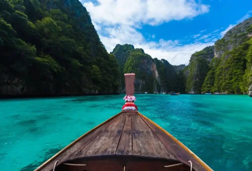 Front of a traditional longtail boat heading into Pileh Lagoon.
