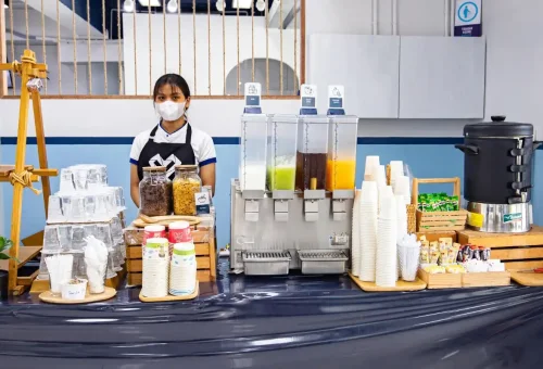 Refreshment station with juices, coffee, snacks before departure