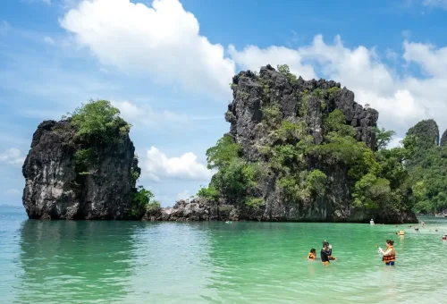Snorkelers enjoying calm waters at Hong Island lagoon