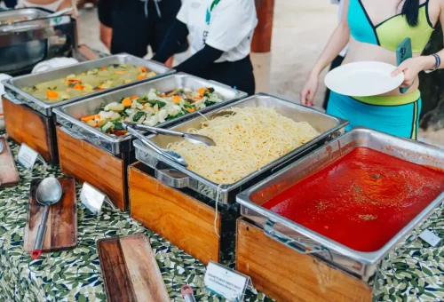 Pasta, curry, and Thai dishes served at an island buffet stop on the luxury sunset cruise.