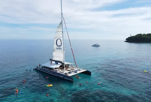 Luxury catamaran Ombre anchored near Racha Island for snorkeling